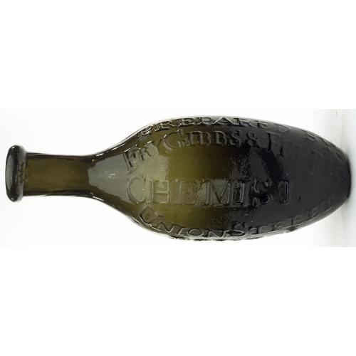 179 - BRISTOL BLACK GLASS EMBOSSED HAMILTON. 7.4ins long. Strong black glass, very dark olive green where ... 