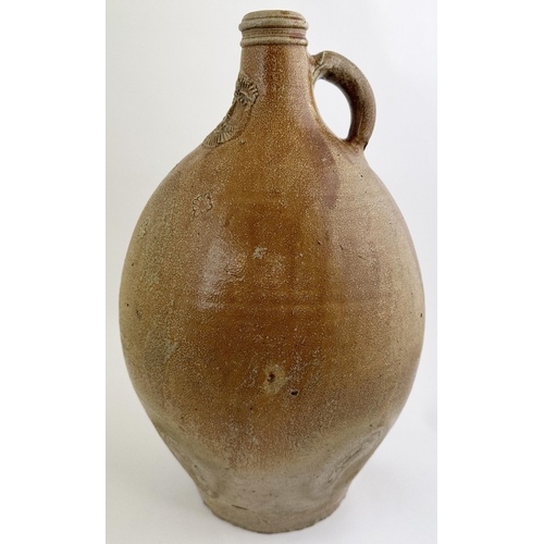 141 - BELLARMINE JUG. 17ins tall. Large size, familiar baluster body shape jug, rear hand applied handle. ... 