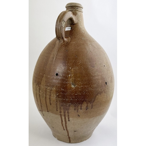 141 - BELLARMINE JUG. 17ins tall. Large size, familiar baluster body shape jug, rear hand applied handle. ... 