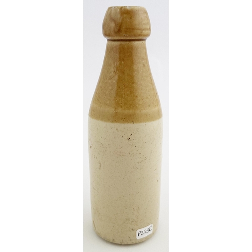 156 - SOUTH SHIELDS ROBERT HENDERSON GINGER BEER BOTTLE. 7.8ins tall. Ch., t.t., cork lip. Strong black tr... 