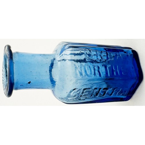 77 - GREAT NORTHERN CENTRAL HOSPITAL POISON BOTTLE. 2.2ins tall. Mid to light blue hexagonal. Three panel... 