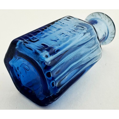 77 - GREAT NORTHERN CENTRAL HOSPITAL POISON BOTTLE. 2.2ins tall. Mid to light blue hexagonal. Three panel... 