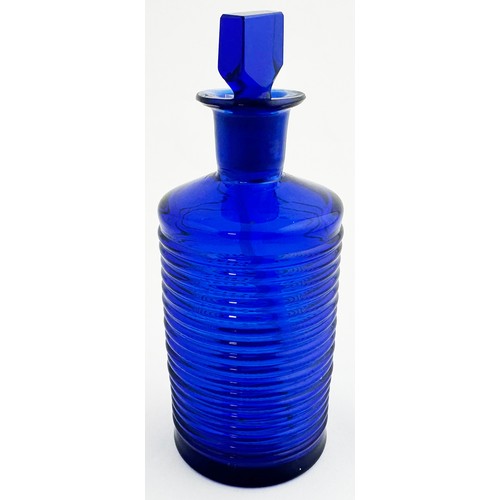 52 - POTHS POISON BOTTLE. (DP p153, C&D-2). 6.6ins tall. Distinctive raised horizontal ribs encircle enti... 