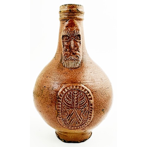 140 - BELLARMINE JUG. 8.2ins tall. Delightful all brown salt glaze classic baluster body, rear handle, sgr... 