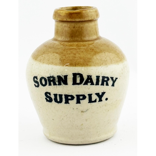 246 - SORN DAIRY SUPPLY JUG ? 4ins tall. Pouring lip. Minor repair.