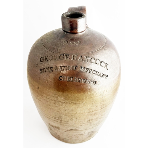 266 - CHELMSFORD FLAGON. 15ins tall. Impressed GEORGE HAYCOCK/ WINE & SPIRIT MERCHANT 2 GALLON, rear handl... 