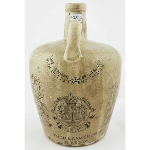 344 - MY QUEEN JUBILEE BLEND WHISKY JUG. 7.75ins tall. Massivley decorated jug all around, rear handle, Po... 