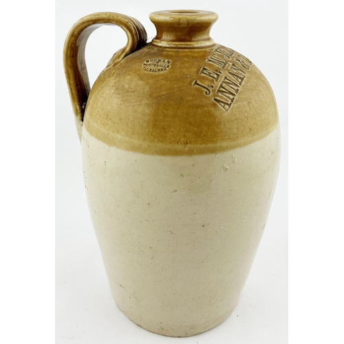 356 - IMPRESSED ANNAN & LOCKERBIE FLAGON. 10.5ins tall. Rear handle & p.m. Damages.