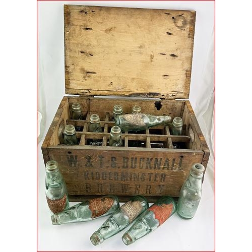 396 - KIDDERMINSTER CRATE OF CODDS. Most codds with original paper labels (worn). One codd has a fixed gla... 