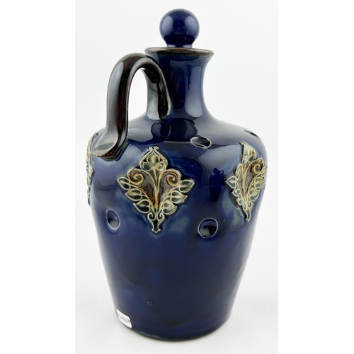 413 - ROYAL DOULTON SCOTCH WHISKY ARTWARE DECANTER. 9.25ins tall. Blue glaze, green leaf type imprints rou... 