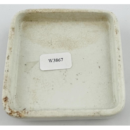 438 - OTTO OF ROSE POT LID. 2.5ins diam. Square lid, COLD CREAM, several directions underneath. Minor craz... 