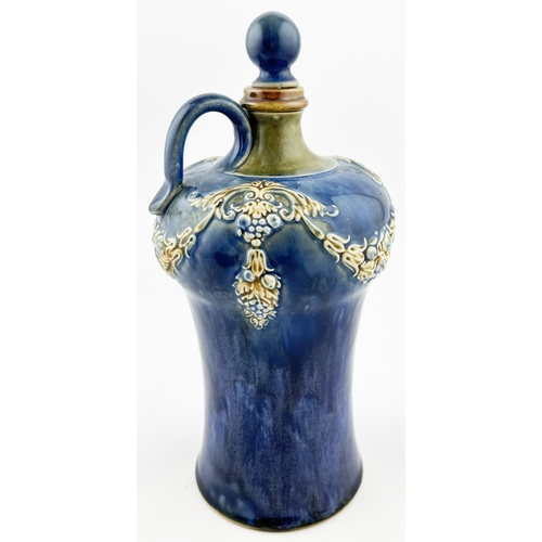 441 - ROYAL DOULTON WHISKY DECANTER. 10ins tall. Blue body with raised brown & blue swagged floral decorat... 