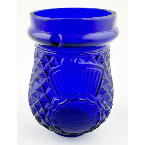 452 - THISTLE DESIGN WITH SHAMROCKS NIGHT LIGHT. 3.5ins tall. Cobalt blue glass, thistle pic to either sid... 