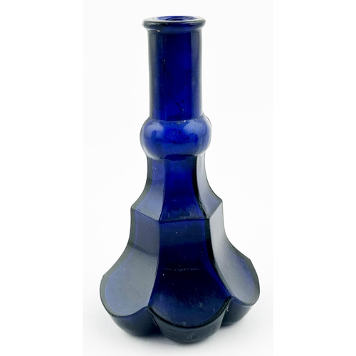 453 - CROSSE & BLACKWELL ESSENCE BOTTLE. 4ins tall. Cobalt blue glass, embossed letters C & B under bottom... 