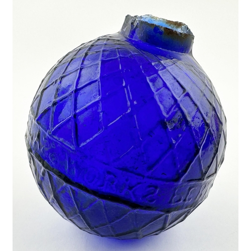 457 - PERTH GLASS WORKS TARGET BALL. 2.75ins tall. Deep cobalt blue glass. Diamond lattice body, letters w... 