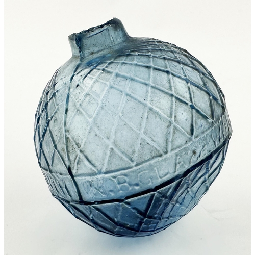 458 - N B PERTH GLASS WORKS TARGET BALL. 3ins tall. Icey blue glass. Diamond lattice body, letters within ... 