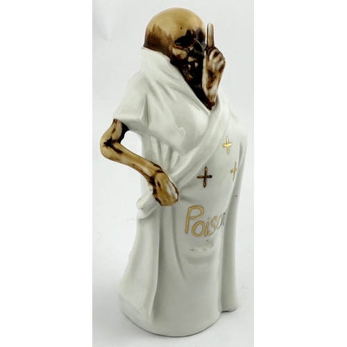 472 - REAPER FIGURAL POISON BOTTLE. (DP p21) 6.9ins tall. Skeleton pointing finger upward with gold impres... 