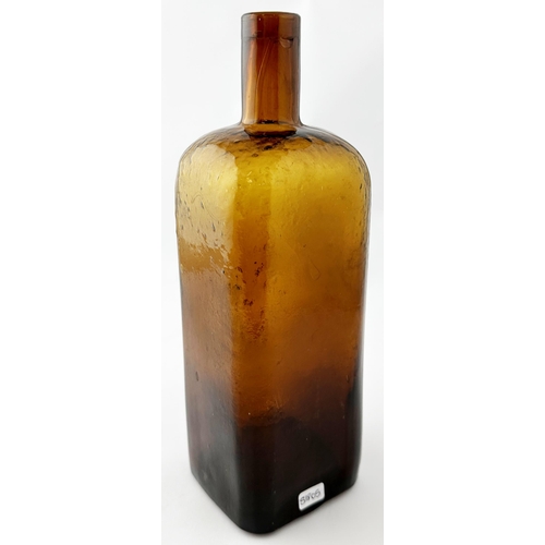 480 - WM RADAMS MICROBE KILLER BOTTLE. 10.5ins tall. Deep amber glass rectangular shape. Crude embossing (... 