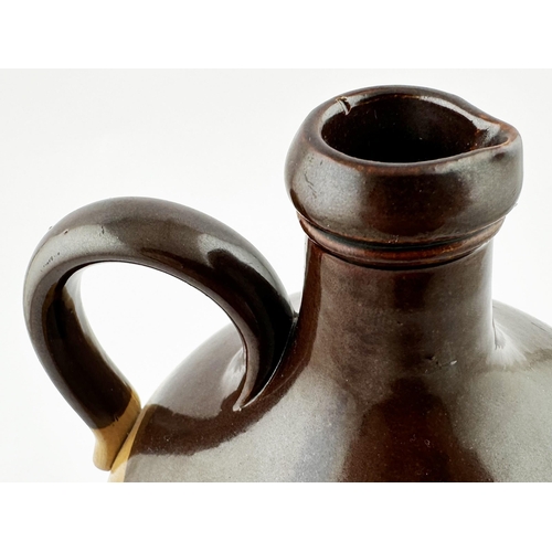 483 - ABBOTSFORD WHISKEY JUG. (WG p11). The very first jug in the Whisky Jug book. 9.3ins tall. Salt glaze... 