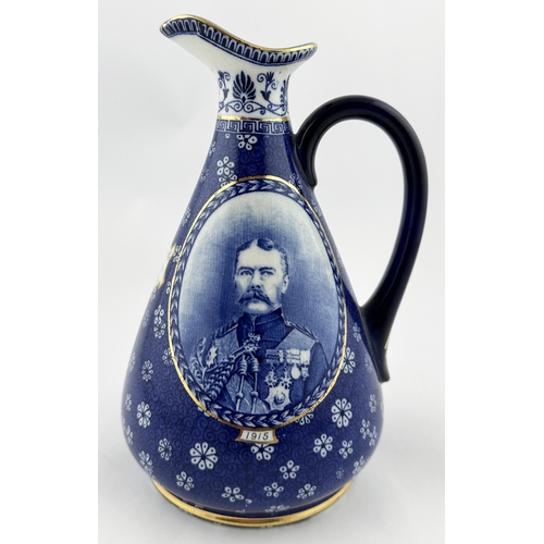 488 - JAS WATSON CENTENARY WHISKY DECANTER. 8.5ins. Attractive blue & white ornately decorated pear shape ... 