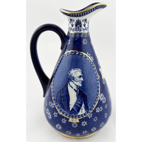 488 - JAS WATSON CENTENARY WHISKY DECANTER. 8.5ins. Attractive blue & white ornately decorated pear shape ... 