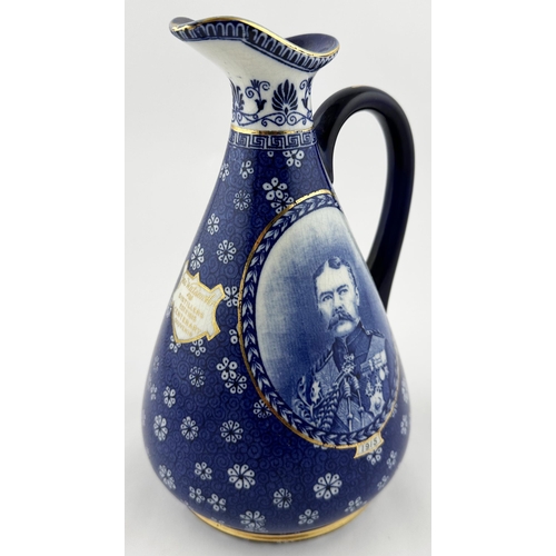 488 - JAS WATSON CENTENARY WHISKY DECANTER. 8.5ins. Attractive blue & white ornately decorated pear shape ... 