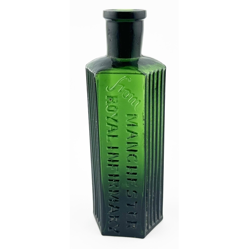 497 - MANCHESTER ROYAL INFIRMARY POISON BOTTLE. DP p100. 5.3ins tall. Green hexagonal bottle, ribs each si... 