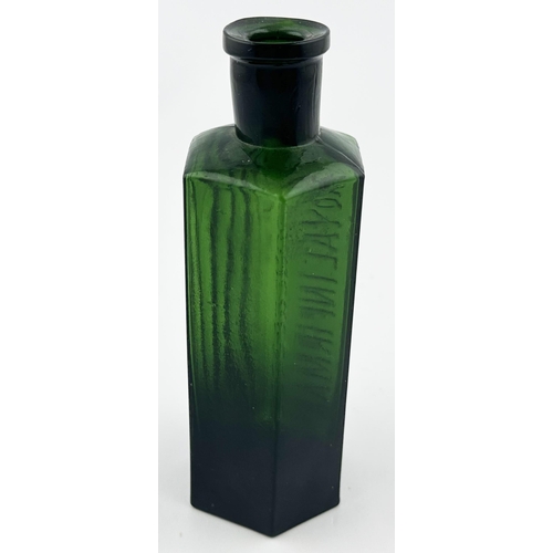 497 - MANCHESTER ROYAL INFIRMARY POISON BOTTLE. DP p100. 5.3ins tall. Green hexagonal bottle, ribs each si... 