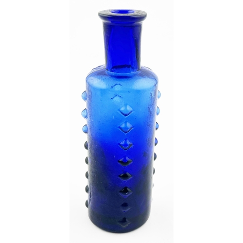 499 - L & T PATENT POISON BOTTLE. DP p50. 4.6ins tall. Cobalt blue, 8 projecting vertical rows of projecti... 