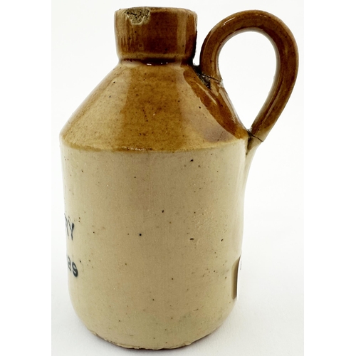 512 - LEDBURY 1929 MINIATURE FLAGON. 2.75ins tall. Tan top, black transfer, rear handle been reglued, repa... 