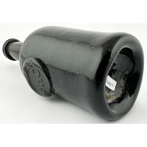 520 - . SPLIT SIZE HHC SEALED CYLINDER WINE BOTTLE. Unrecorded in Burton. 8.5ins tall. Black glass, c. 186... 