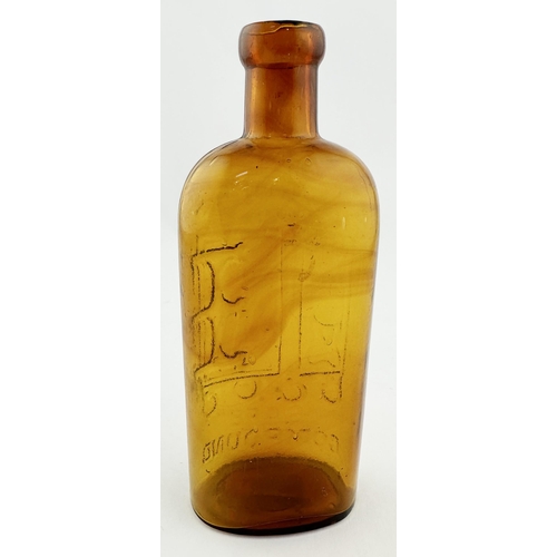 524 - WARNERS SAFE COMPOUND BOTTLE. 6ins tall. Golden amber glass with very distinctive & attractive darke... 