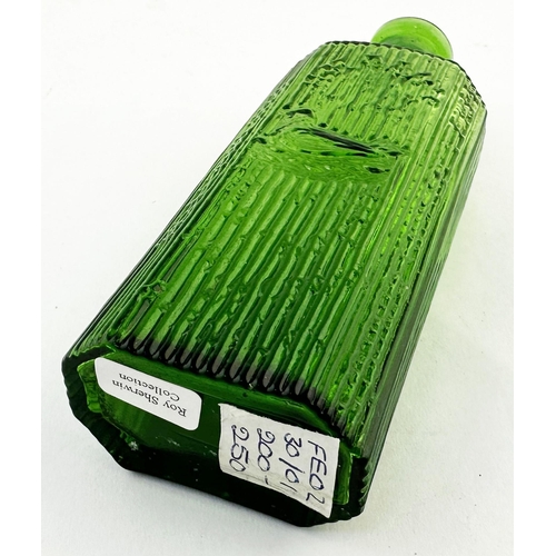 525 - HOLDENS BARNSLEY TOMMY CURE BOTTLE. 5.7ins tall. vivid bright green glass. Rectangular shape, facett... 