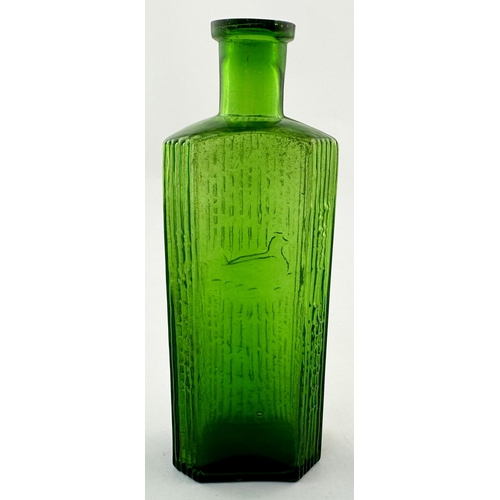 525 - HOLDENS BARNSLEY TOMMY CURE BOTTLE. 5.7ins tall. vivid bright green glass. Rectangular shape, facett... 