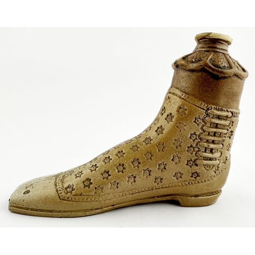 534 - SALT GLAZE BOOT SPIRIT FLASK. 4ins tall. Decoratively impressed with stars & laces to one side. Smal... 