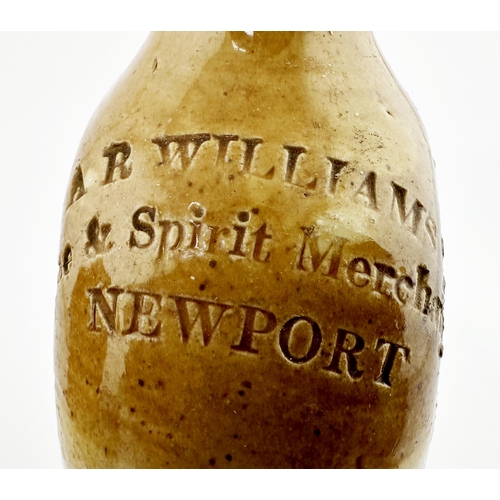 538 - NEWPORT SPIRIT FLASK. 5.25ins tall. T.t, impressed A R WILLIAMS/ WINE & SPIRIT MERCHANTS. Two flat s... 