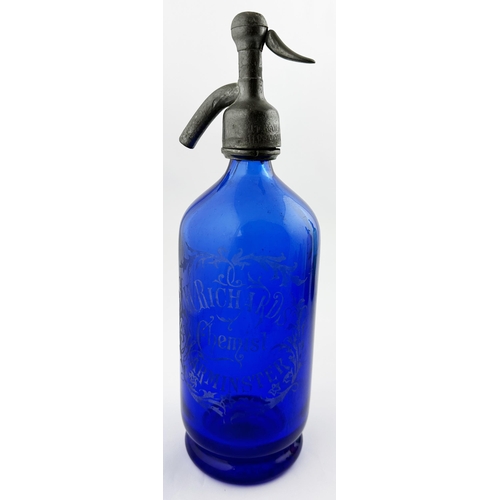 551 - WARMINSTER SODA SYPHON. 12ins tall. Cobalt blue glass, footed base. Acid etched leaf type pattern H.... 