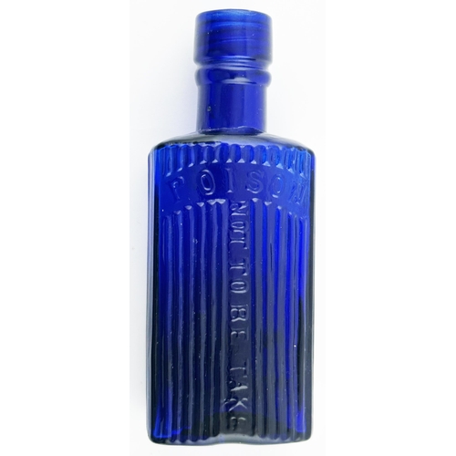 562 - OVAL POISON BOTTLE. (DP p106) 4.6ins tall. Cobalt blue, vertically ribbed with embossing POISON/ NOT... 