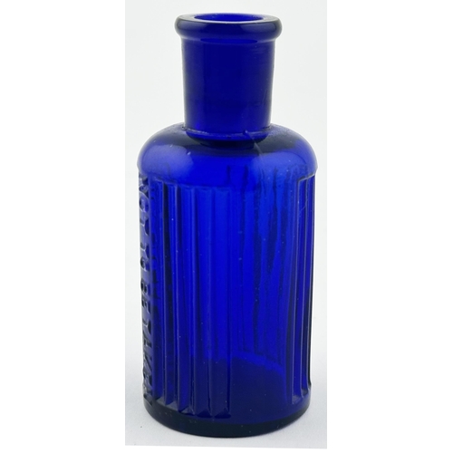 563 - BAILEY POISON BOTTLE. (DP p67) 3ins tall. Cobalt blue cylinder, vertically ribbed with embossing NOT... 