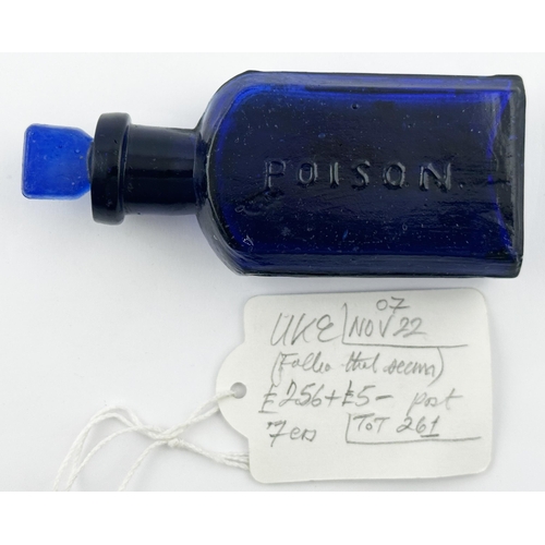 565 - RECTANGULAR POISON BOTTLE. (DP p 112) 3.6ins tall. Cobalt blue, vertical ribbing & embossing to both... 