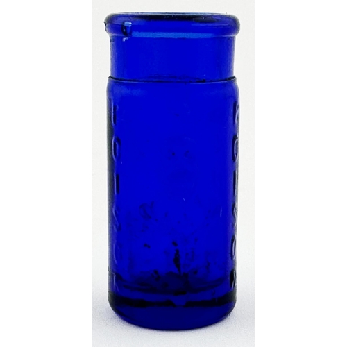 567 - EUROPEAN/ AMERICAN POISON BOTTLE. 2ins tall. Cobalt blue, circular, embossed with POISON plus skull ... 