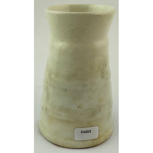 570 - HISLOP & SON CREAM POT. 3.75ins tall. White with black transfer, churn shape. Base p.m. Slight body ... 