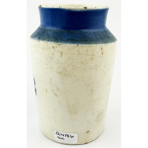 572 - EXPRESS DAIRY CO CREAM POT. 4ins tall. Blue top, off white body. Blue transfer, flowers to front for... 