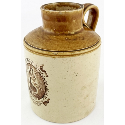 573 - STRANRAER FRESH CREAM JUG. 7ins tall. Brown top, brown transfer. Rear handle. Milkmaid pict to centr... 