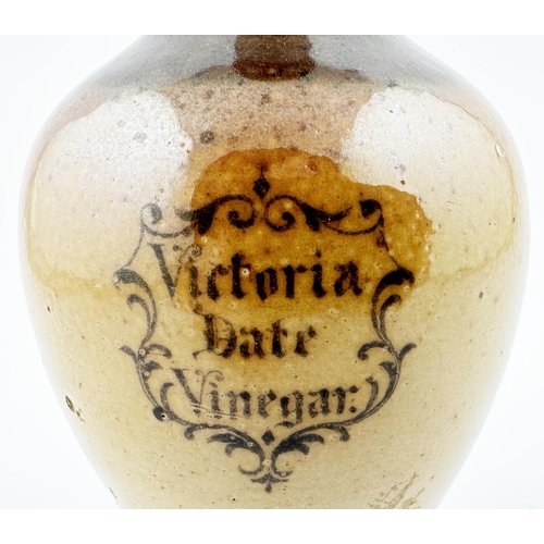 579 - DOULTON LAMBETH VICTORIA DATE VINEGAR DISPENSER. 5.6ins tall. Brown top, tan body, black transfer wi... 