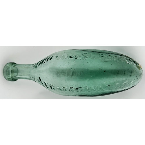 589 - J. SCHWEPPES & CO HAMILTON. 8.5ins long. Teal green glass, heavily embossed 51 BERNERS STREET/ OXFOR... 