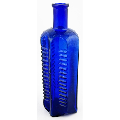 611 - ETON STAR POISON BOTTLE. (DP p58) 6.7ins tall. Cobalt blue, horizontally ribbed, vertical embossing ... 