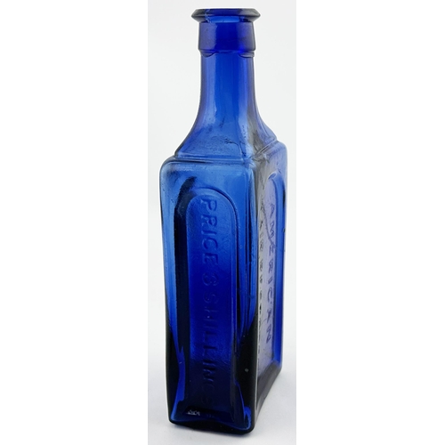 612 - AMERICAN HAIR RESTORER BOTTLE. 7.6ins tall. Cobalt blue, rectangular, embossed to three sides F E SI... 