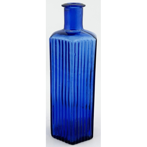 615 - BIRMINGHAM HOSPITAL BOTTLE. (DP p101) 6.6ins tall. Cobalt blue, vertically ribbed to three sides, em... 