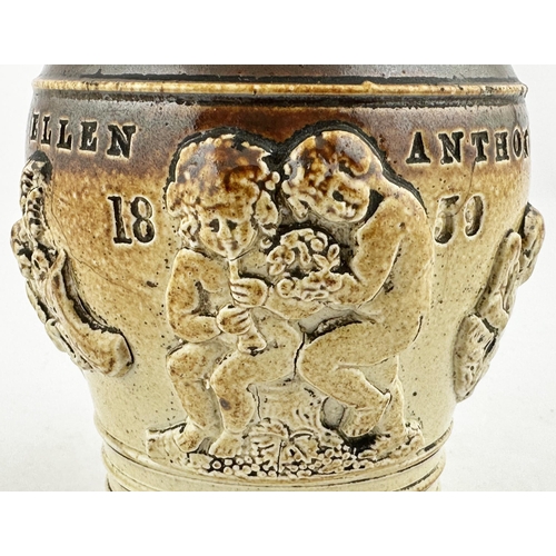 623 - 1859 SALT GLAZE MONEY BOX. 5.5ins tall. Impressed ELLEN ANTHONY with cherub sprigs to body, dog figu... 